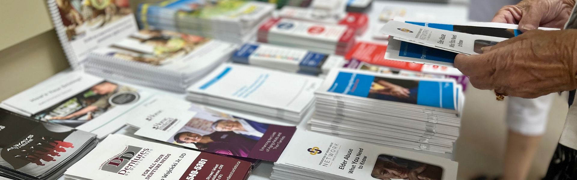 Series of Pamphlets on a Table