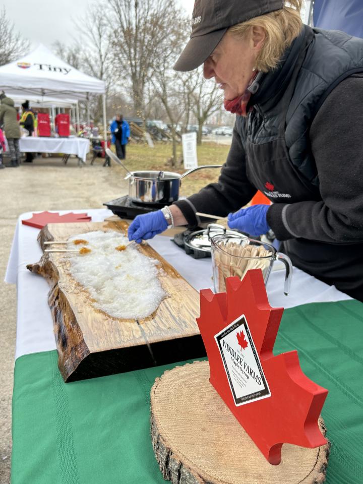 Windlee Farms owner making maple taffy