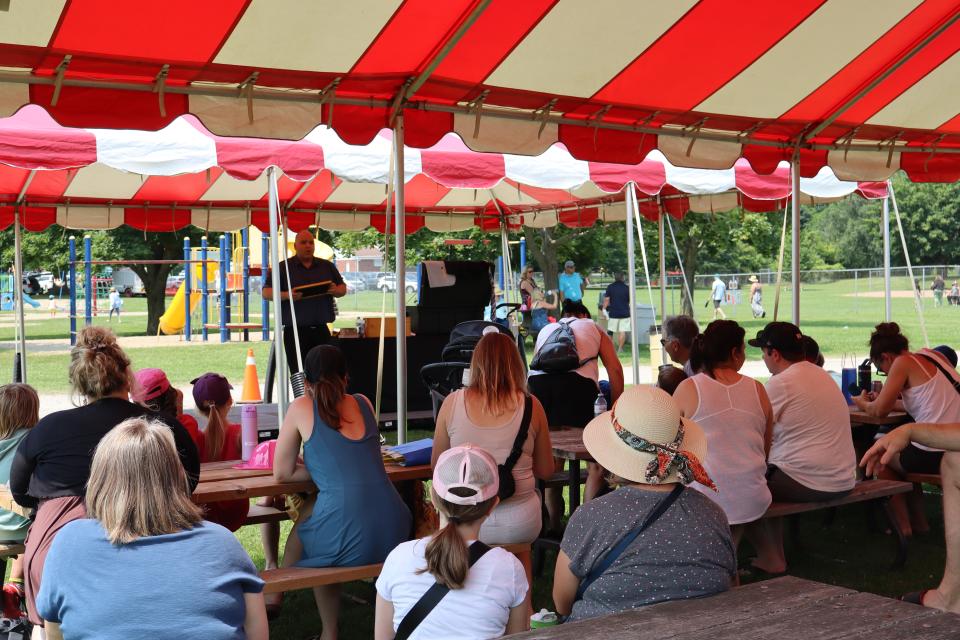 Crowd gathered to watch the magic show