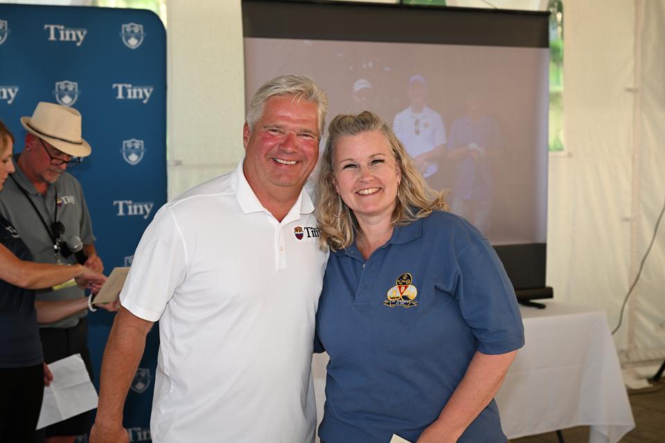 Mayor Evans congratulating the closest to the pin ladies winner