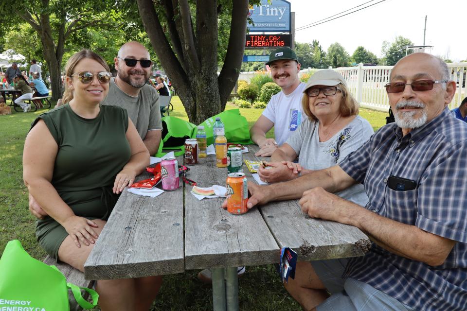 Group of people enjoying lunch at the BBQ