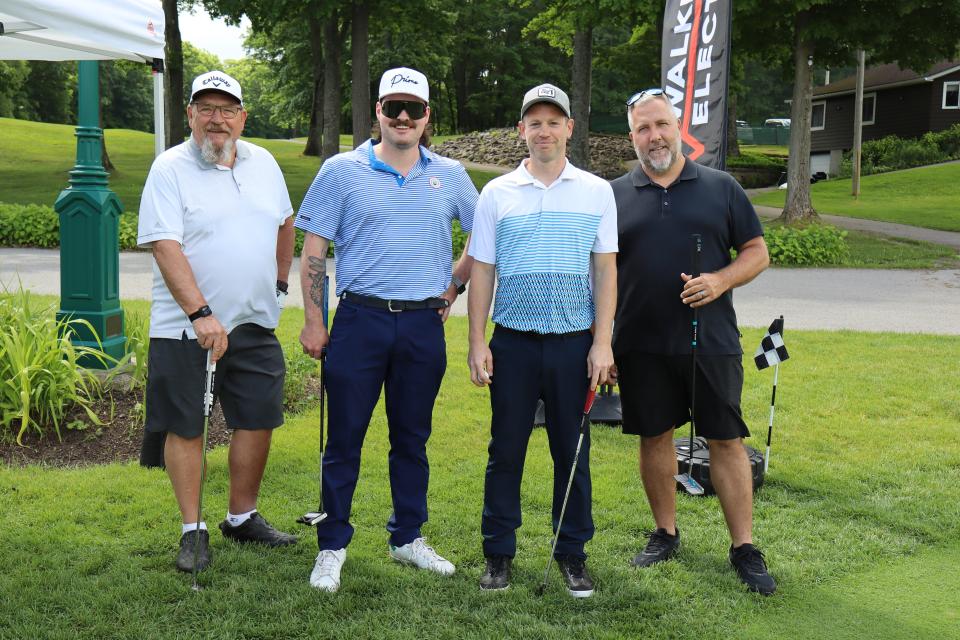 Men's foursome at the Mayor's putting challenge