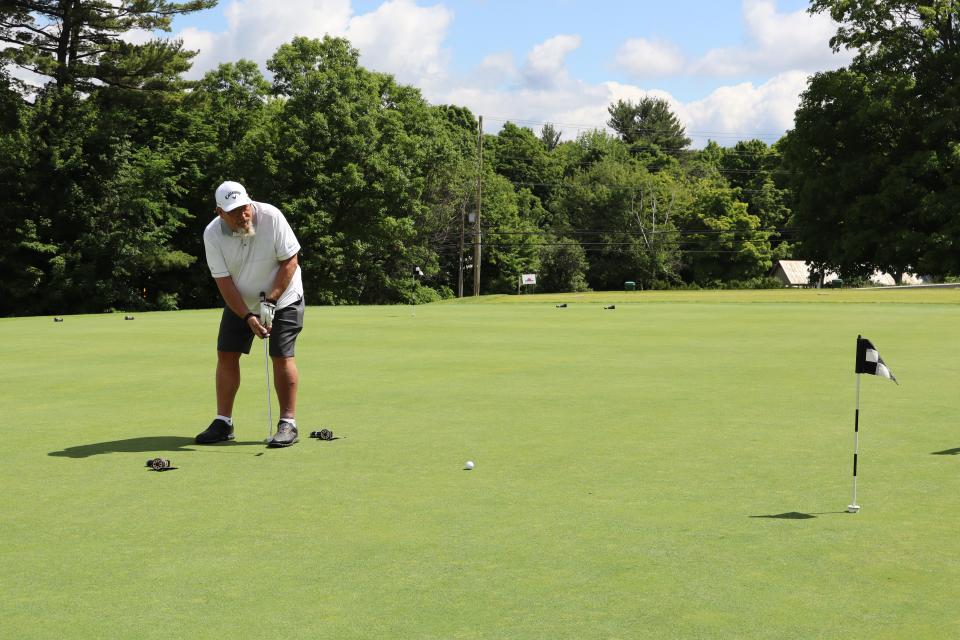 Male golfer at the Mayor's putting challenge