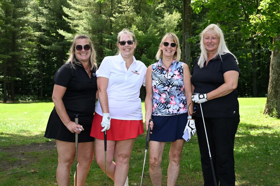 Women's golf foursome out on the greens