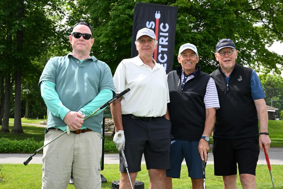 Men's golf foursome at the Mayor's putting challenge