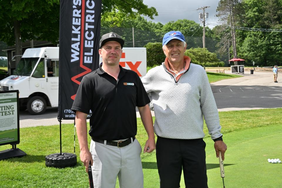 Men's pair in front of the Mayor's putting challenge