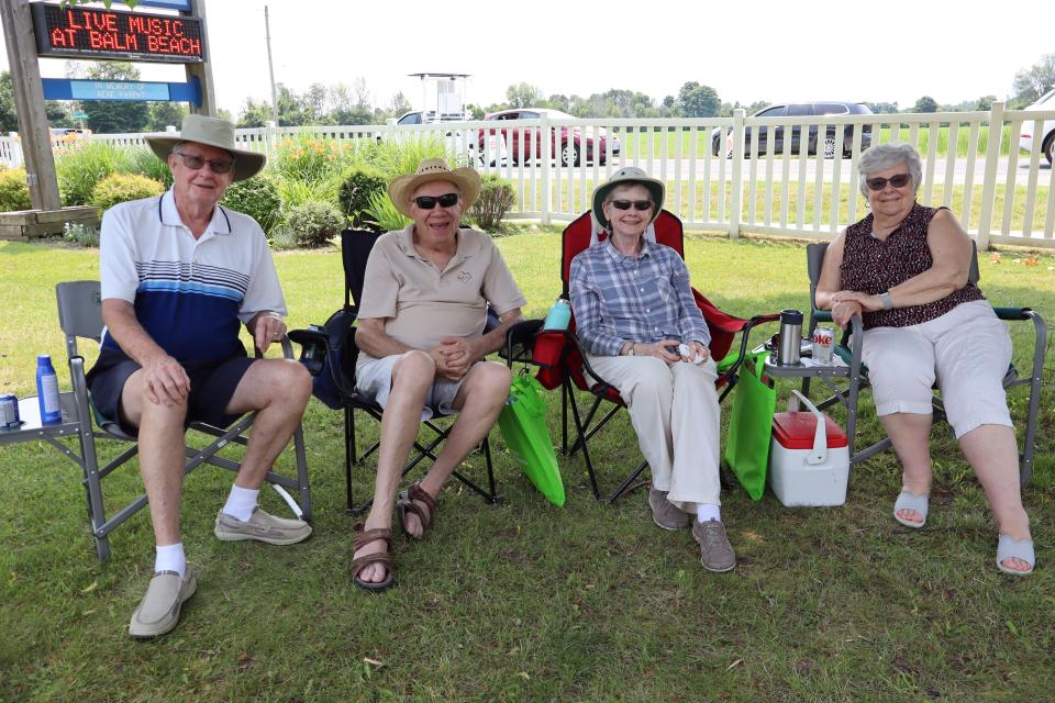 Seniors enjoying the live music in their lawn chairs