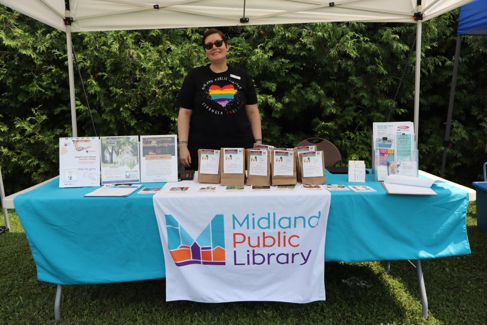 Staff at the Midland Public Library tent