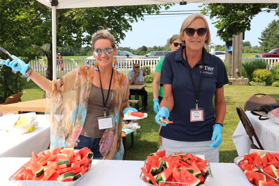 Volunteers at the watermelon tent