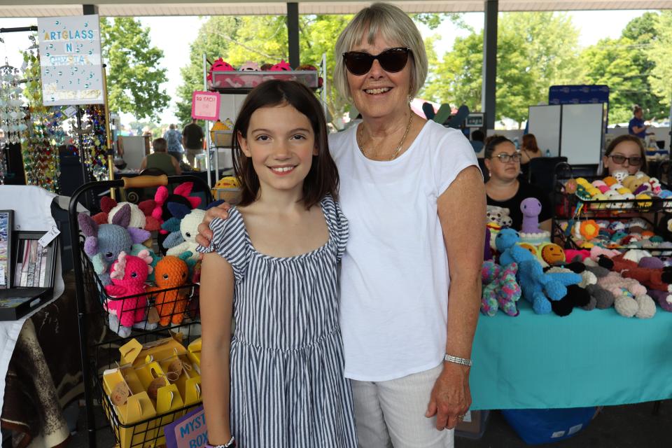 Woman and young girl at the vendor fair