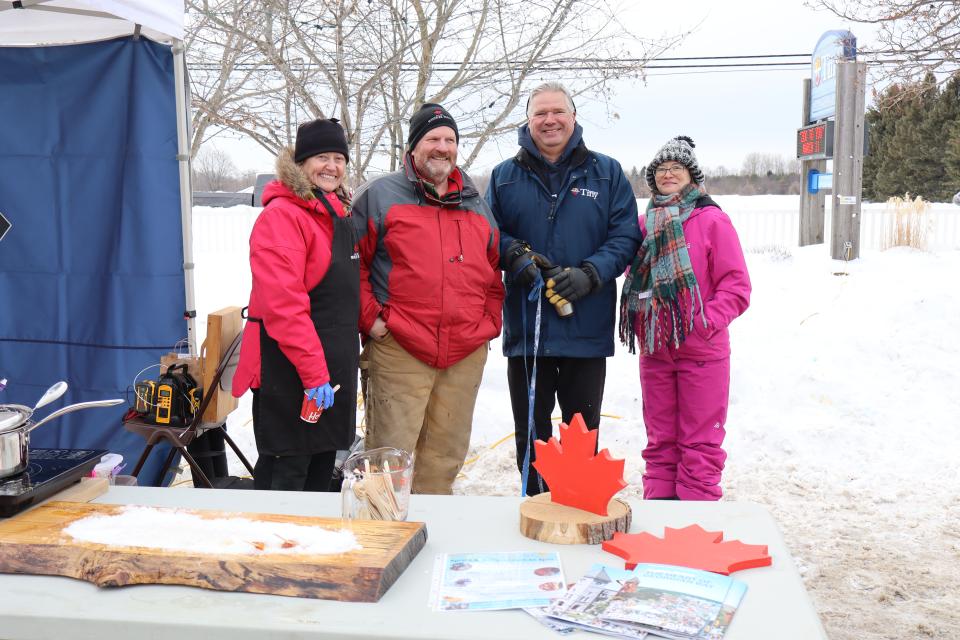 Mayor Evans with the owners of Windlee Farms and staff at the Midland Public Library