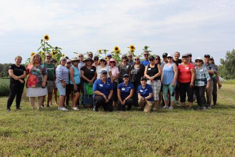 group shot of the owners of Thunder Beach Acres and farm crawl participants